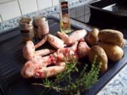 Hähnchenflügel mit Kartoffelspalten - Rezept