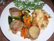 Schweinemedaillons mit Zucchini, Möhren und Champignon Gratin - Rezept
