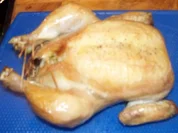 Brathähnchen mit Laugengebäck-Pilz-Füllung - Rezept