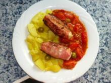 Kabeljau in Salami gebraten mit lauwarmem Tomatensalat - Rezept