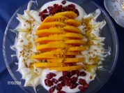Papaya mit Jogurth-Honig-Soße und Cranbeerys - Rezept