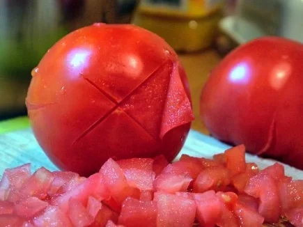 Hähnchen in fruchtiger Tomate mit Kartoffelwedges - Rezept - Bild Nr. 3