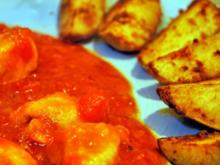 Hähnchen in fruchtiger Tomate mit Kartoffelwedges - Rezept