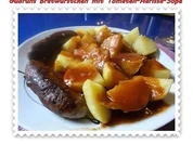 Fleisch: Bratwürstchen mit Tomaten-Harissa-Soße und Pellkartoffeln - Rezept