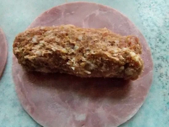 Rezept: Schinken-Hack-Röllchen in cremiger Tomatensoße Bild Nr. 2 Schinken-Hack-Röllchen in cremiger Tomatensoße - Rezept - Bild Nr. 2