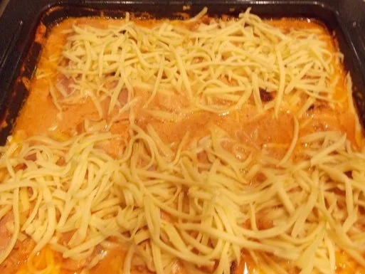 Rezept: Schinken-Hack-Röllchen in cremiger Tomatensoße Bild Nr. 5 Schinken-Hack-Röllchen in cremiger Tomatensoße - Rezept - Bild Nr. 5