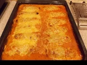 Schinken-Hack-Röllchen in cremiger Tomatensoße - Rezept