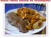 Fleisch: Pikantes Rumpsteak mit Kartoffelspalten und Tomatensoße - Rezept