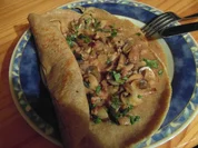 Kräuterpfannkuchen mit Pilzragout - Rezept