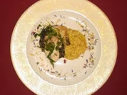 Schwarzer und weißer Risotto mit Orangen, Hühnchen und Steinpilzen - Rezept
