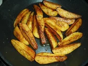 Rezept: Kartoffelspalten mit Majoran Kartoffelspalten mit Majoran - Rezept