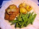 Panierte Nackensteaks mit grünen Bohnen - Rezept