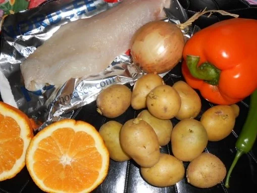 Rotbarschfilet aus dem Ofen mit pikanten Kartoffelspalten - Rezept - Bild Nr. 2