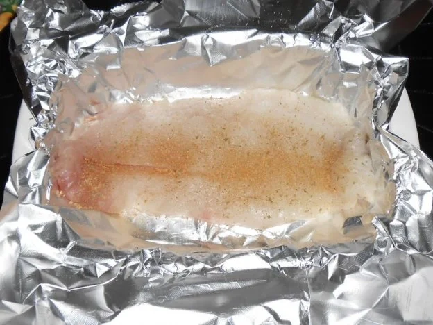 Rotbarschfilet aus dem Ofen mit pikanten Kartoffelspalten - Rezept - Bild Nr. 3