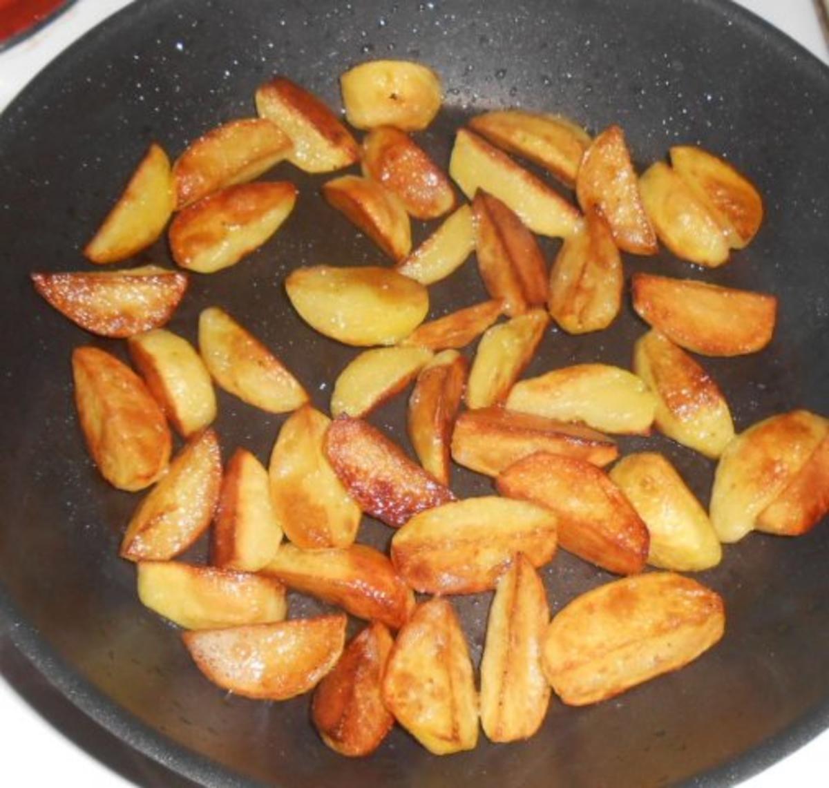 Rotbarschfilet aus dem Ofen mit pikanten Kartoffelspalten - Rezept - Bild Nr. 8