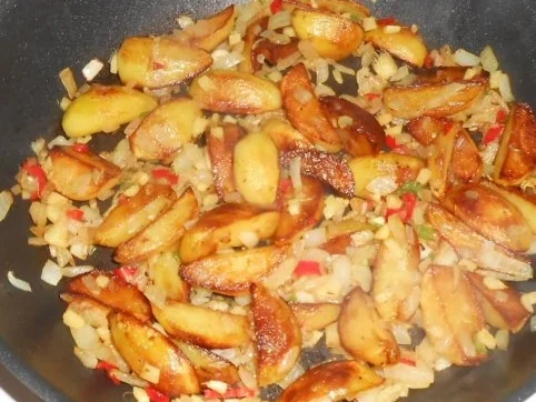 Rotbarschfilet aus dem Ofen mit pikanten Kartoffelspalten - Rezept - Bild Nr. 9