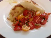Panierte Kohrabischeiben mit  Tomaten - Rezept