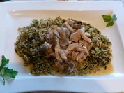 Pilz-Rahmgeschnetzeltes auf Kräuterreis - Rezept