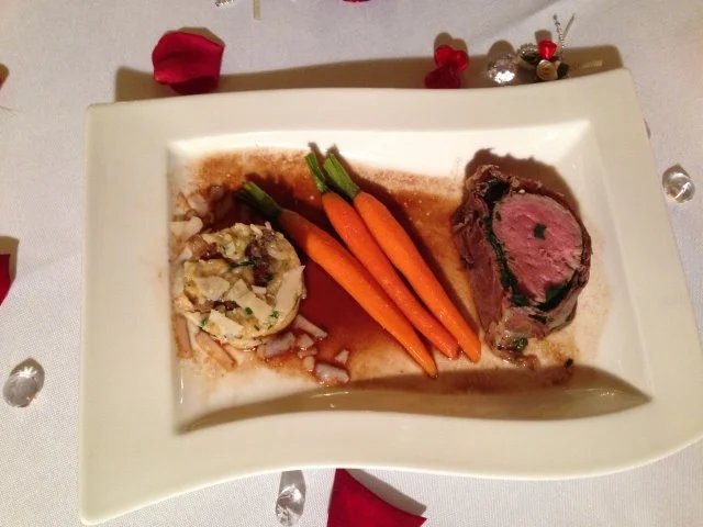 Rezept: Kalbsfilet in Schinken-Kräuter-Mantel an Trüffel-Steinpilz-Risotto und Heidemöhrchen Kalbsfilet in Schinken-Kräuter-Mantel an Trüffel-Steinpilz-Risotto und Heidemöhrchen - Rezept