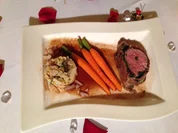 Kalbsfilet in Schinken-Kräuter-Mantel an Trüffel-Steinpilz-Risotto und Heidemöhrchen - Rezept