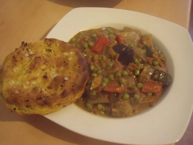 Rezept: Indischer Eintopf mit Kartoffelküchlein Indischer Eintopf mit Kartoffelküchlein - Rezept