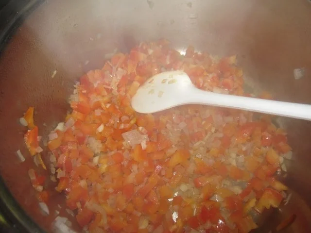 Rezept: Hähnchenbrust in Serranoschinken mit Djuvec-Reis Bild Nr. 7 Hähnchenbrust in Serranoschinken mit Djuvec-Reis - Rezept - Bild Nr. 7