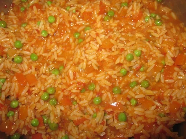 Rezept: Hähnchenbrust in Serranoschinken mit Djuvec-Reis Bild Nr. 9 Hähnchenbrust in Serranoschinken mit Djuvec-Reis - Rezept - Bild Nr. 9