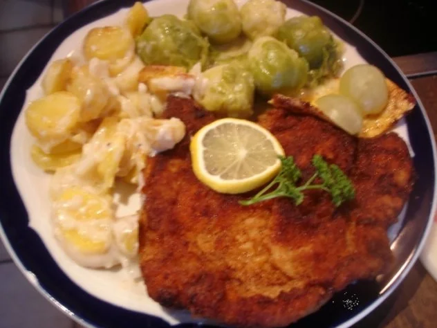 Rezept: Stielkotelett mit Rosenkohl und Kartoffelgratin Stielkotelett mit Rosenkohl und Kartoffelgratin - Rezept