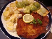 Stielkotelett mit Rosenkohl und Kartoffelgratin - Rezept