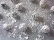 Schoki-Nuss-Schneekugeln - Rezept