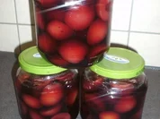 Rotweinpflaumen mit Rum - Rezept