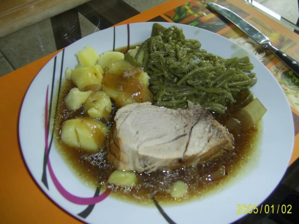 Bilder für Schwein: Würziger Rollbraten mit grünen Bohnen - Rezept