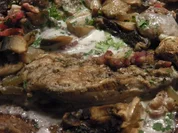 Jägerpfanne: Jägerschnitzel in Pilzsoße - Rezept