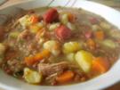 Roter Linseneintopf mit Bauchfleisch und Cabanossi - Rezept