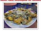 Kartoffeln: Pikante Kartoffelspalten mit Lauchsahne - Rezept