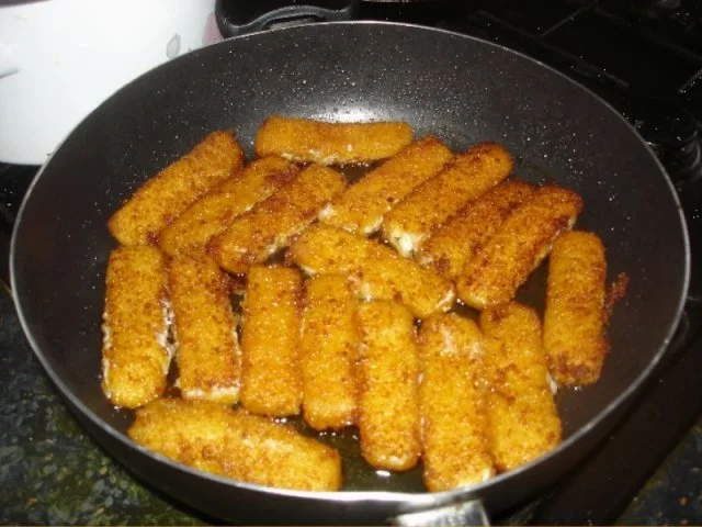 Fischstäbchen mit Sellerie-Kartoffelstampf und Buttermais - Rezept - Bild Nr. 6