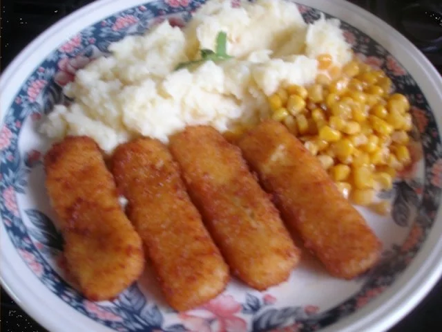 Fischstäbchen mit Sellerie-Kartoffelstampf und Buttermais - Rezept - Bild Nr. 8