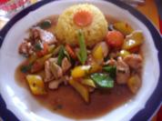 Hähnchen-Wok mit gelben Reis - Rezept