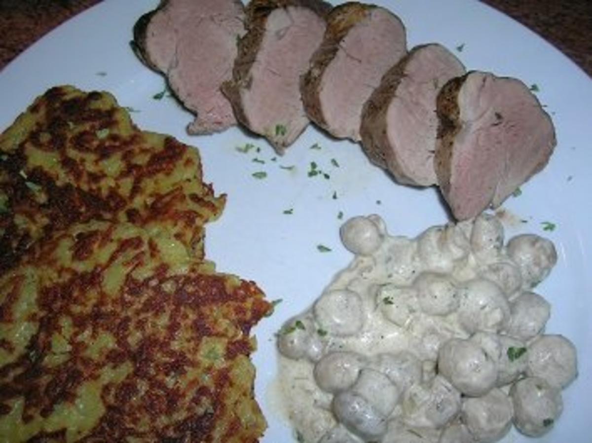 Schweinefilet mit Rahmchampignos an frischen Kartoffelröstis - Rezept