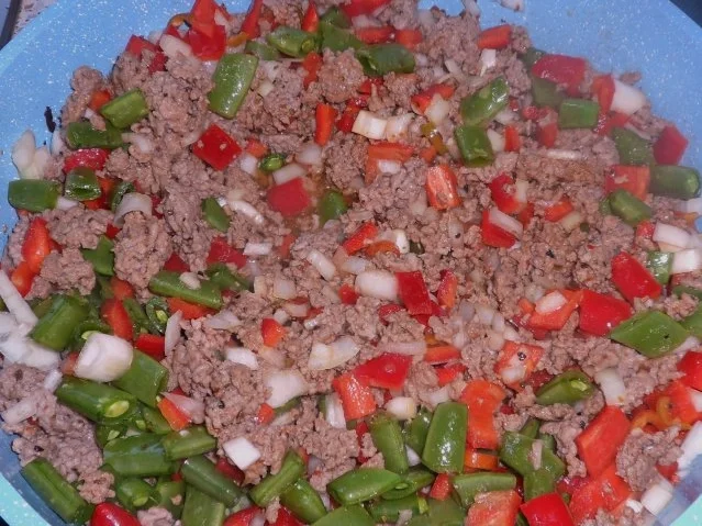 Rezept: Aufläufe/Gratins: Pikanter Chili-Con-Carne-Auflauf mit Cheddar & Tortilla-Kruste Bild Nr. 5 Aufläufe/Gratins: Pikanter Chili-Con-Carne-Auflauf mit Cheddar & Tortilla-Kruste - Rezept - Bild Nr. 5