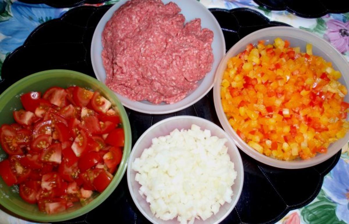 Hackfleisch-Paprikasoße und Spaghetti mit Oliven - Rezept - Bild Nr. 3