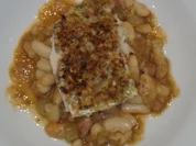 Cassoulet mit weissen Bohnen und gratiniertem Seewolffilet - Rezept