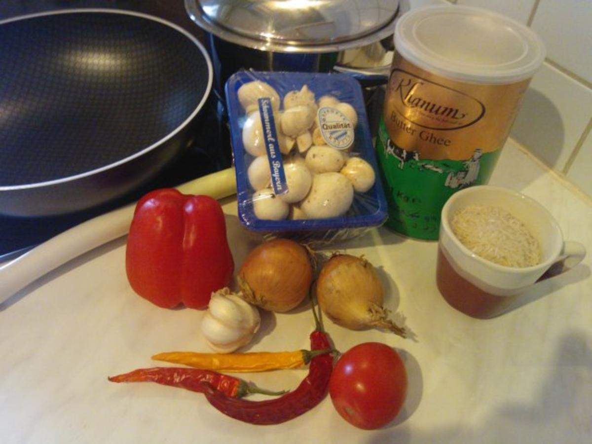 Champignon-Gemüse-Pfanne auf Reisbett - Rezept