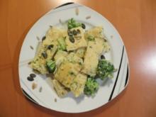Ravioli mit Kräuter-Frischkäse-Füllung, Broccoliröschen und Kürbiskernen - Rezept