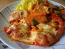 Steak mit Paprika in Tomatensauce überbacken - Rezept