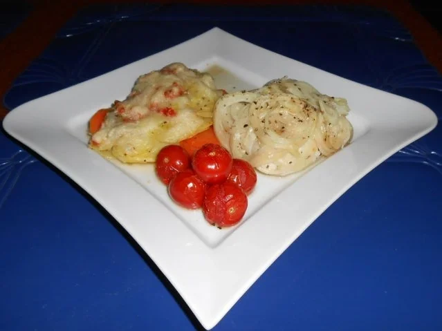 Kabeljaurückenfilet aus dem Ofen mit überbackenem Karotten-Kartoffelgemüse - Rezept