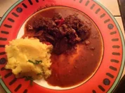 Geschmorte Hühnerleber mit Kartoffelpüree - Rezept