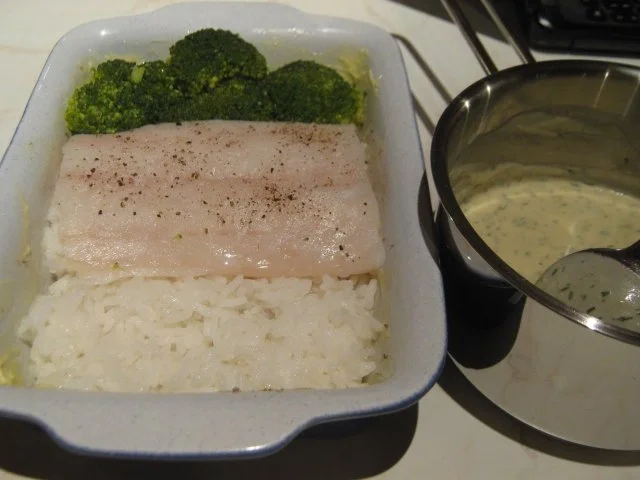 Rezept: Kabeljau auf einem Reisbett, unter Senf-Sahne-Sauce überbacken Bild Nr. 2 Kabeljau auf einem Reisbett, unter Senf-Sahne-Sauce überbacken - Rezept - Bild Nr. 2