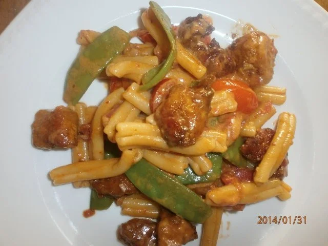 Knusperpute mit Erdnuss-Tomaten-Sosse - Rezept