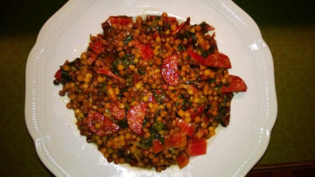 Fregola Sarda tostada mit Mangold, Speck, Salcicca und getrockneten ... Fregola Sarda tostada mit Mangold, Speck, Salcicca und getrockneten ...